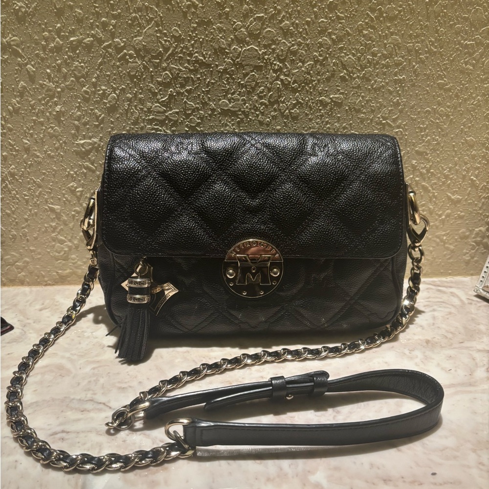 Metrocity Italy quilted caviar leather purse